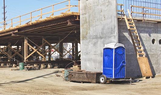 ensuring proper sanitation at the construction site with these portable toilets